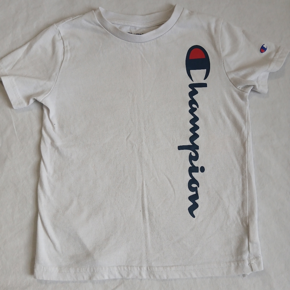 Champion kids’ t-shirt in size 7. Classic white with bold blue and red Champion